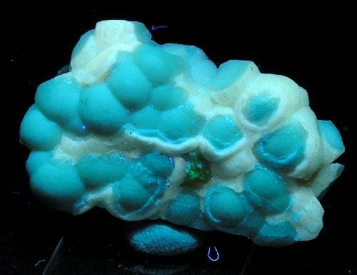 brucite on matrix, ultraviolet light - South Africa