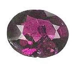 oval-cut alexandrite - incandescent light