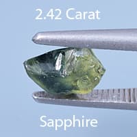 Rough version of Barion Triangle Cut Bi-Color Sapphire